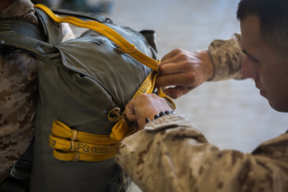 Marines with Combat Logistics Battalion conduct a personnel jump during SLTE 4-26
