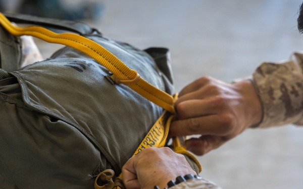 Marines with Combat Logistics Battalion conduct a personnel jump during SLTE 4-26