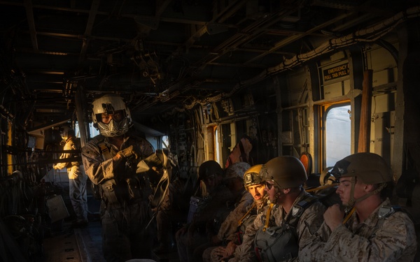 Marines with Combat Logistics Battalion conduct a personnel jump during SLTE 4-26