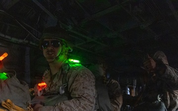 Marines with Combat Logistics Battalion conduct a personnel jump during SLTE 4-26