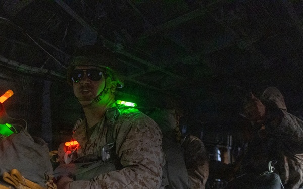 Marines with Combat Logistics Battalion conduct a personnel jump during SLTE 4-26