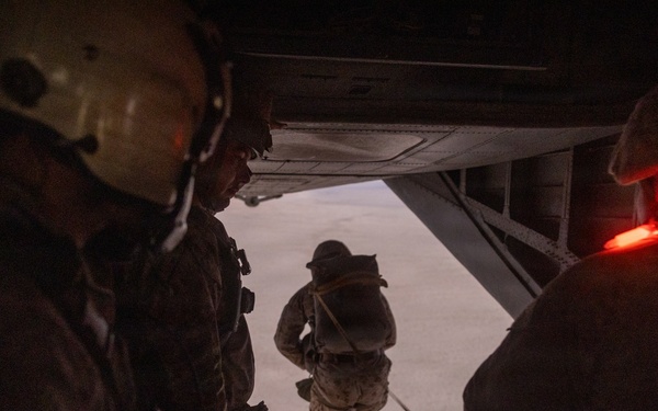 Marines with Combat Logistics Battalion conduct a personnel jump during SLTE 4-26
