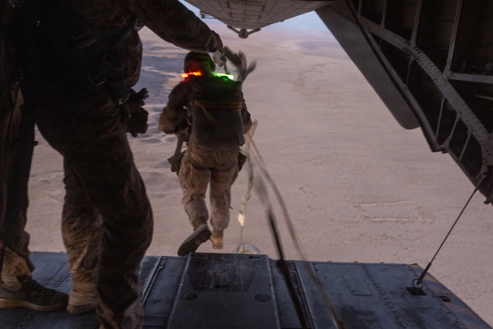 Marines with Combat Logistics Battalion conduct a personnel jump during SLTE 4-26