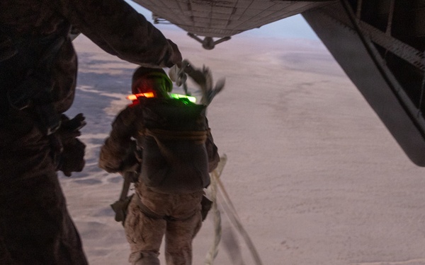 Marines with Combat Logistics Battalion conduct a personnel jump during SLTE 4-26