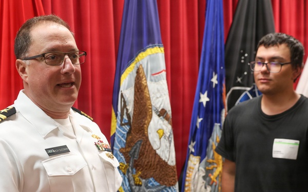 Navy Captain administers Oath of Enlistment for Son on Last Day of Navy Career