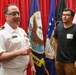 Navy Captain administers Oath of Enlistment for Son on Last Day of Navy Career