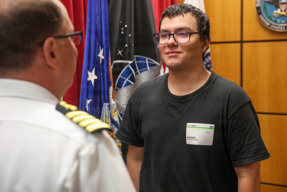 Navy Captain administers Oath of Enlistment for Son on Last Day of Navy Career