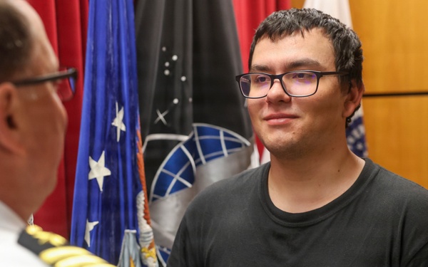 Navy Captain administers Oath of Enlistment for Son on Last Day of Navy Career