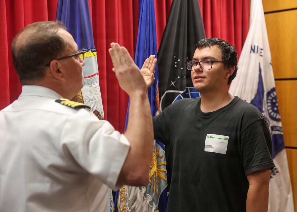 Navy Captain administers Oath of Enlistment for Son on Last Day of Navy Career