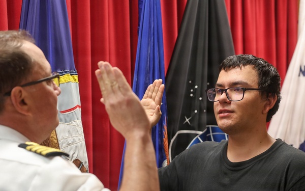 Navy Captain administers Oath of Enlistment for Son on Last Day of Navy Career