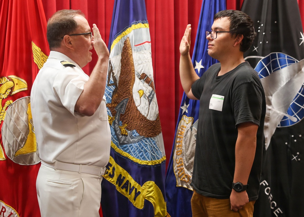 Navy Captain administers Oath of Enlistment for Son on Last Day of Navy Career