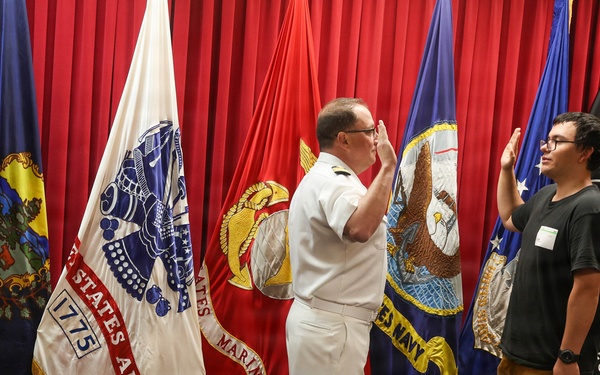Navy Captain administers Oath of Enlistment for Son on Last Day of Navy Career