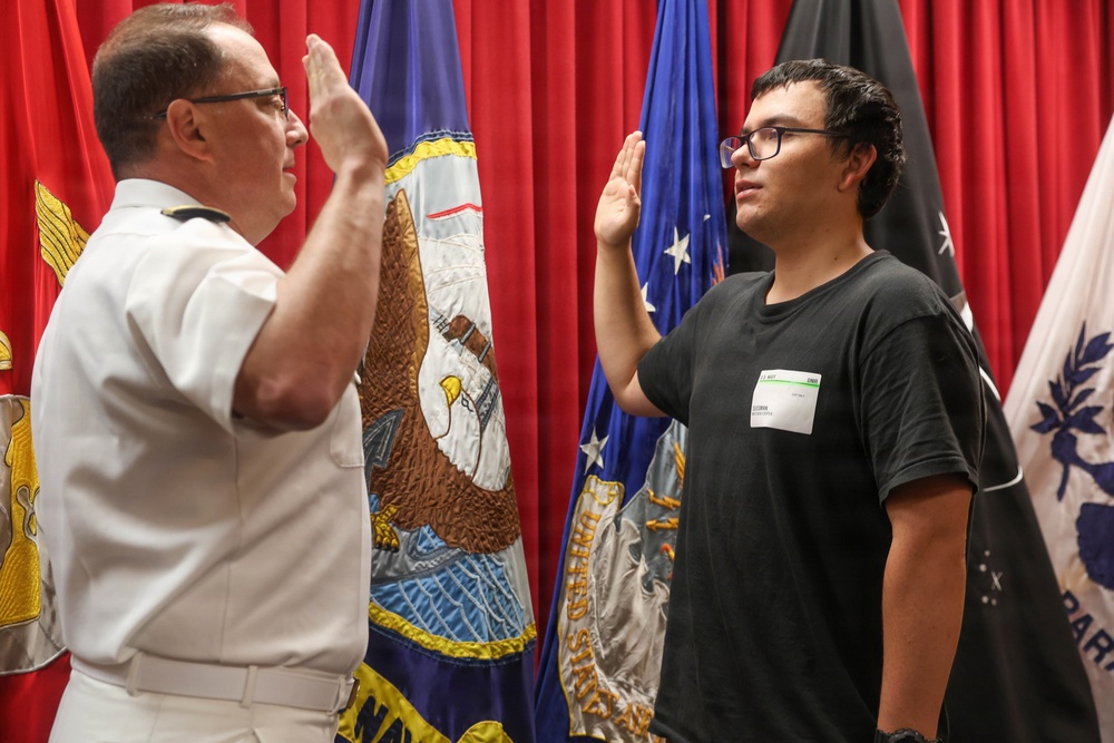 Navy Captain administers Oath of Enlistment for Son on Last Day of Navy Career