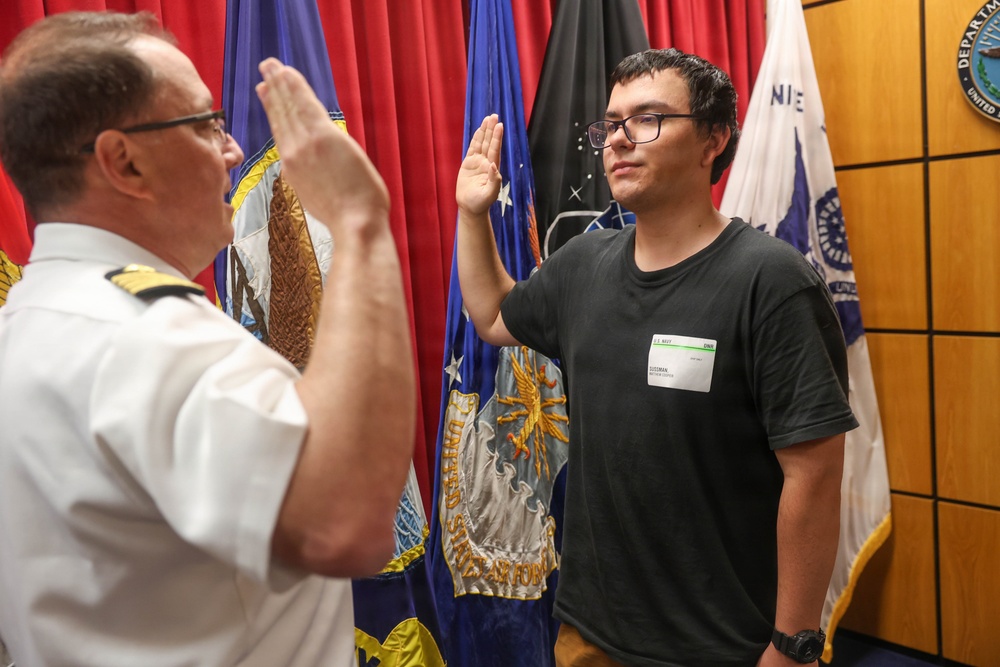Navy Captain administers Oath of Enlistment for Son on Last Day of Navy Career