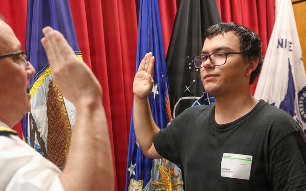 Navy Captain administers Oath of Enlistment for Son on Last Day of Navy Career