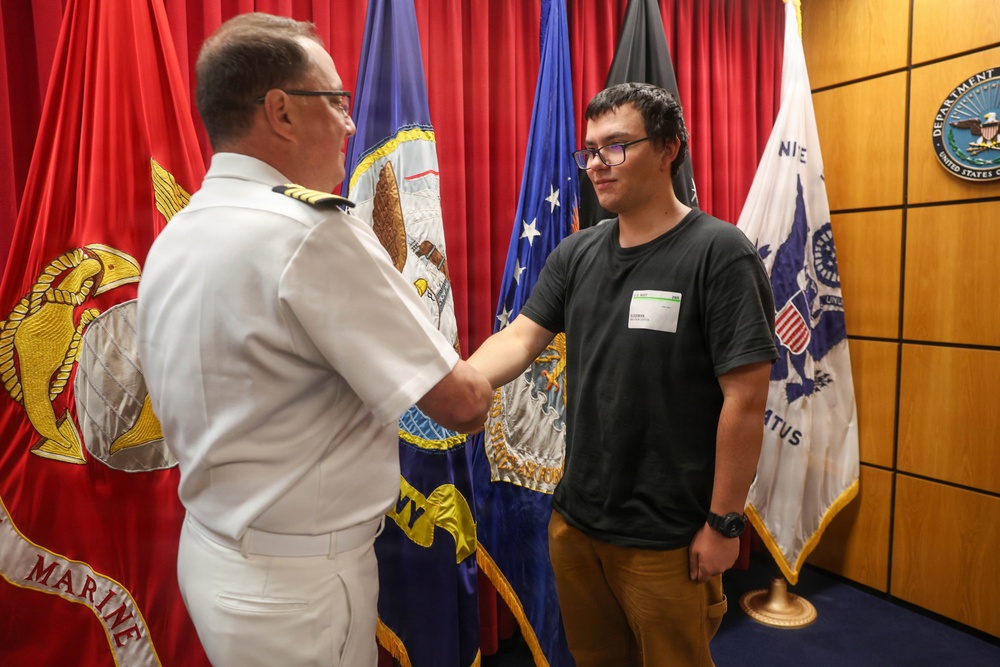 Navy Captain administers Oath of Enlistment for Son on Last Day of Navy Career