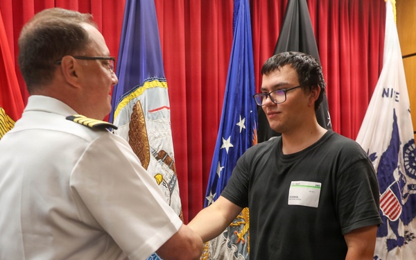 Navy Captain administers Oath of Enlistment for Son on Last Day of Navy Career