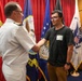 Navy Captain administers Oath of Enlistment for Son on Last Day of Navy Career