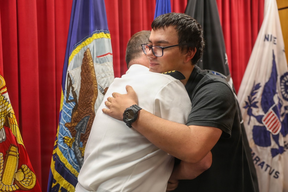Navy Captain administers Oath of Enlistment for Son on Last Day of Navy Career