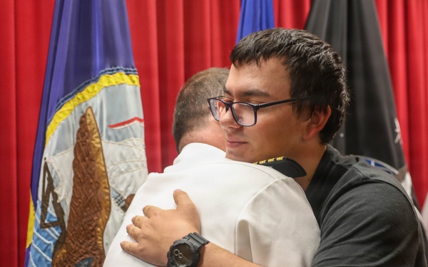 Navy Captain administers Oath of Enlistment for Son on Last Day of Navy Career