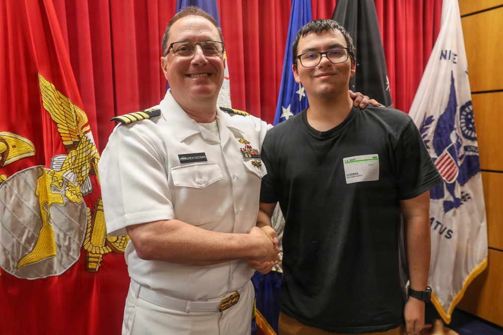 Navy Captain administers Oath of Enlistment for Son on Last Day of Navy Career