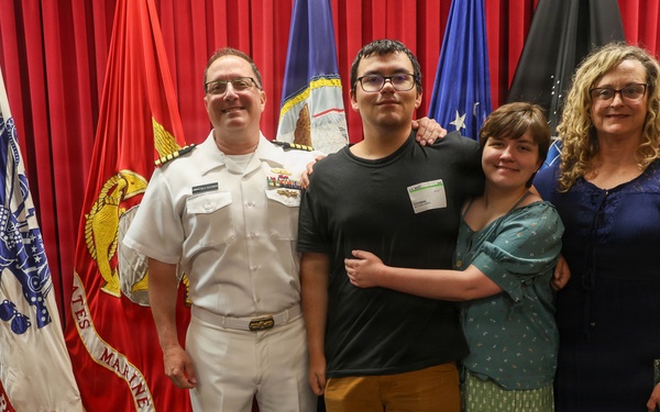 Navy Captain administers Oath of Enlistment for Son on Last Day of Navy Career