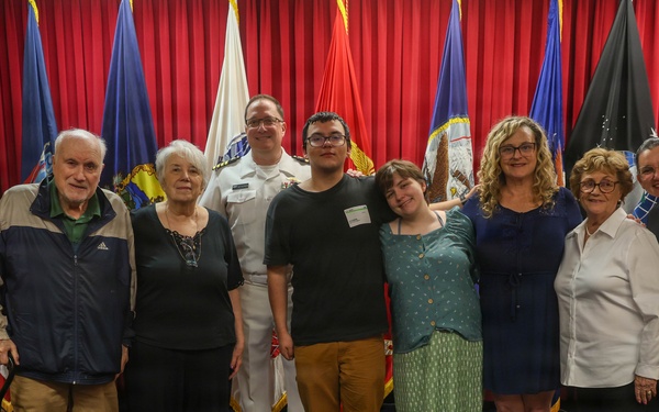 Navy Captain administers Oath of Enlistment for Son on Last Day of Navy Career