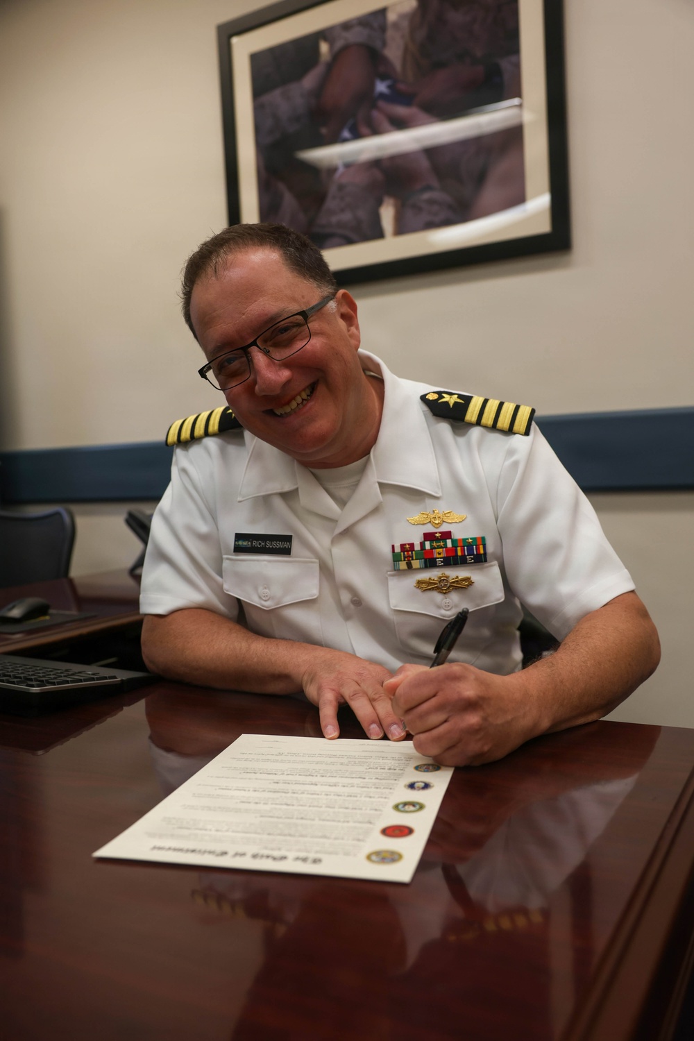 Navy Captain administers Oath of Enlistment for Son on Last Day of Navy Career