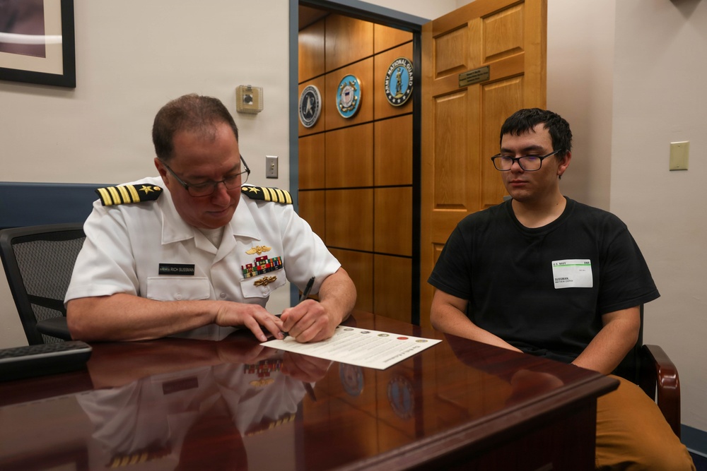 Navy Captain administers Oath of Enlistment for Son on Last Day of Navy Career