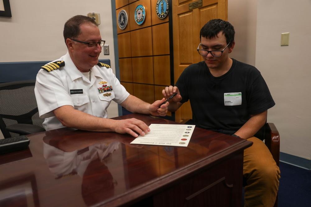 Navy Captain administers Oath of Enlistment for Son on Last Day of Navy Career