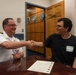 Navy Captain administers Oath of Enlistment for Son on Last Day of Navy Career
