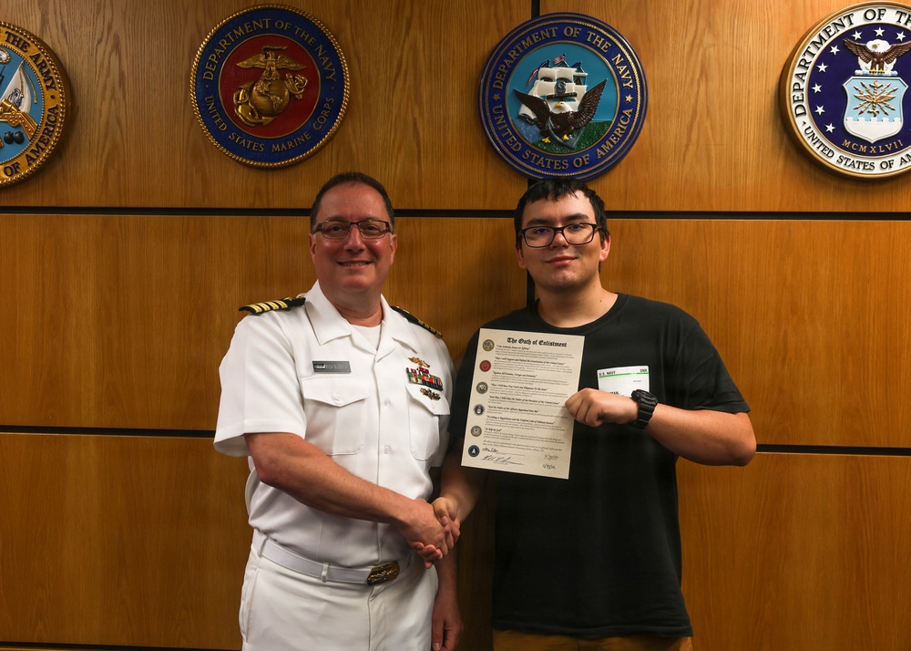 Navy Captain administers Oath of Enlistment for Son on Last Day of Navy Career