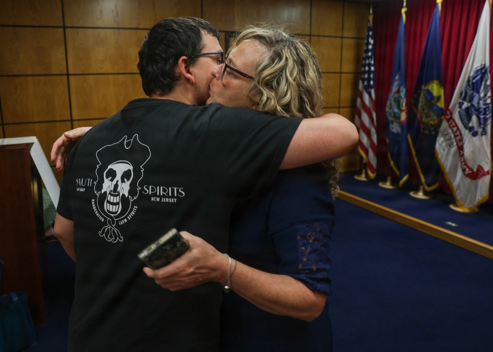 Navy Captain administers Oath of Enlistment for Son on Last Day of Navy Career