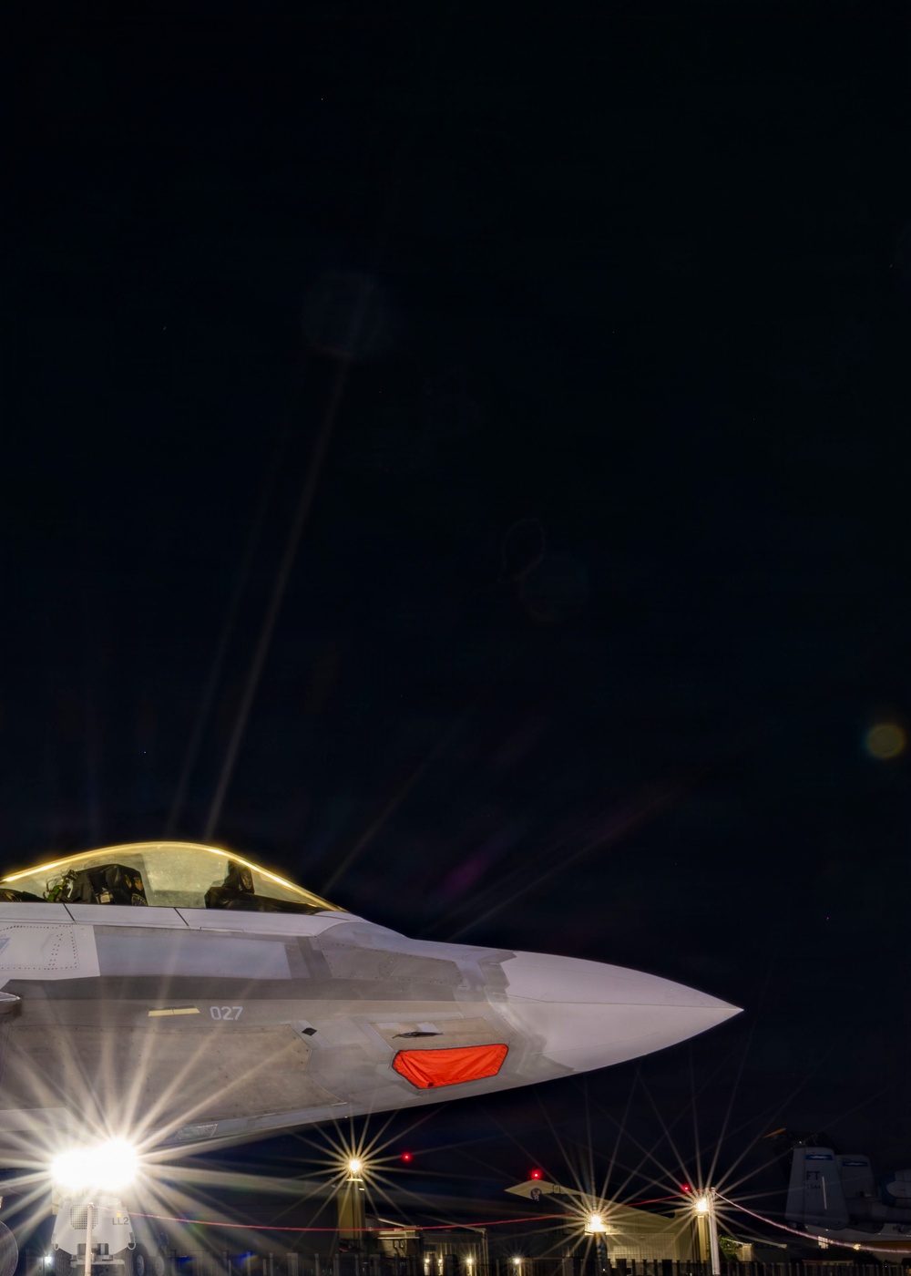 F-22 Raptor under the lights