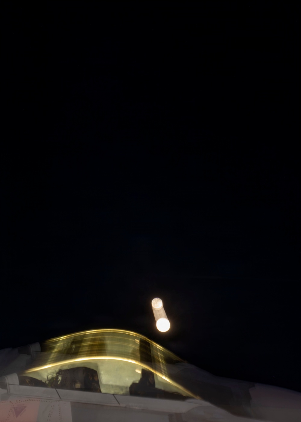 F-22 Raptor under the lights