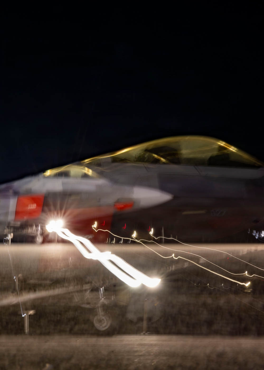 F-22 Raptor under the lights