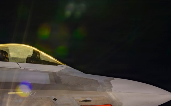 F-22 Raptor under the lights