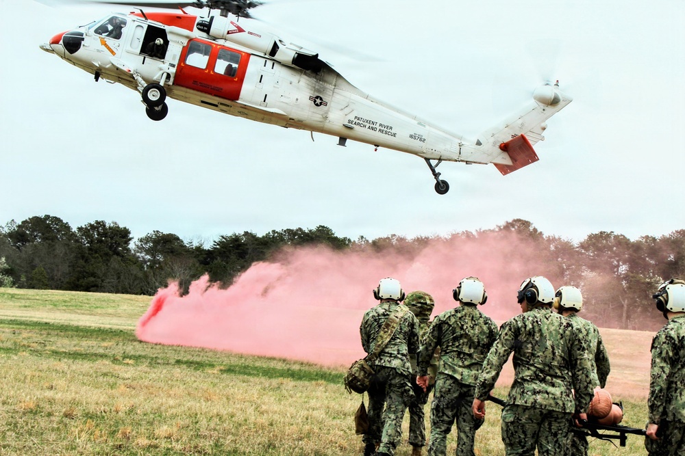 Corpsmen Conduct Live TACEVAC Evolution with NAS Patuxent River SAR DOGS Aircrew
