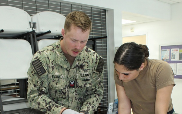 Corpsmen Rehearse Intravenous Access During Tactical Training