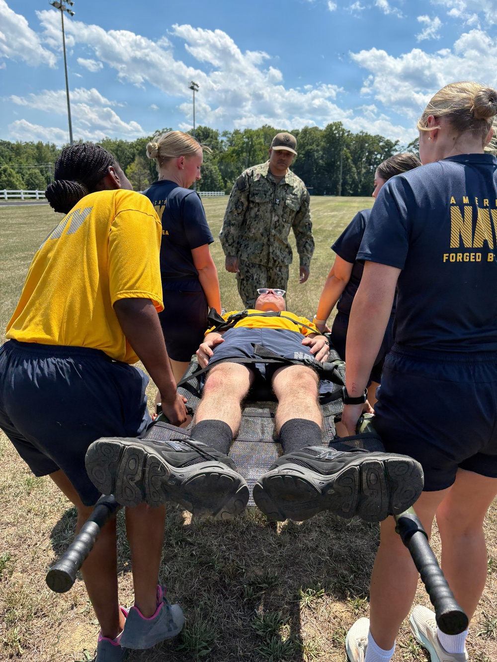 Navy Medical Team Rehearses Casualty Transport Under Senior Corpsman Guidance