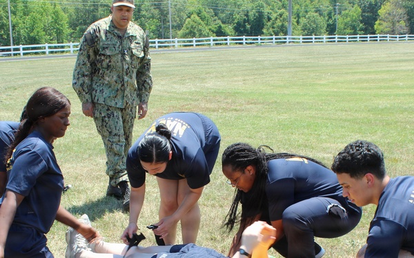 Navy Medical Team Rehearses Casualty Transport Under Senior Corpsman Guidance