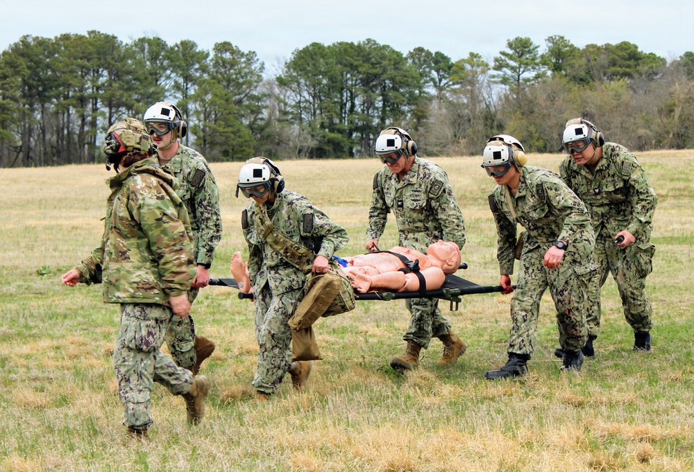 Patuxent River Commanding Officer Joins Corpsmen in SAR Helicopter Evacuation Drill