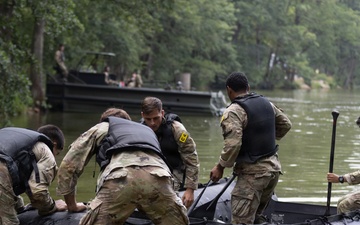 U.S. Army Europe and Africa Best Squad Competitors Conduct Zodiac Water Crossing