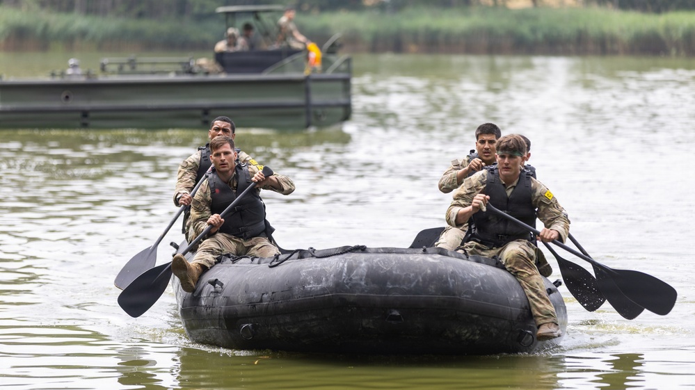 U.S. Army Europe and Africa Best Squad Competitors Conduct Zodiac Water Crossing