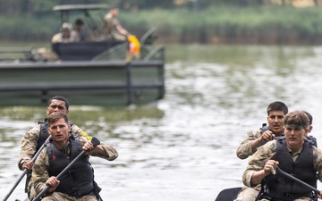 U.S. Army Europe and Africa Best Squad Competitors Conduct Zodiac Water Crossing