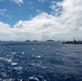 Multinational ships sail in formation during RIMPAC 2026