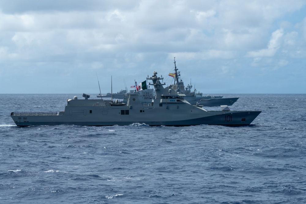 Multinational ships sail in formation during RIMPAC 2026