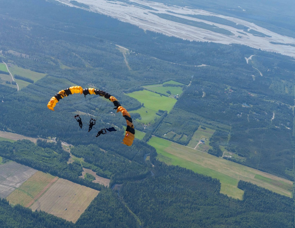 The U.S. Army Parachute Team jumps for Arctic Lightning Open House