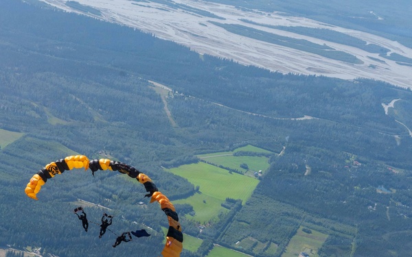 The U.S. Army Parachute Team jumps for Arctic Lightning Open House