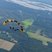 The U.S. Army Parachute Team jumps for Arctic Lightning Open House